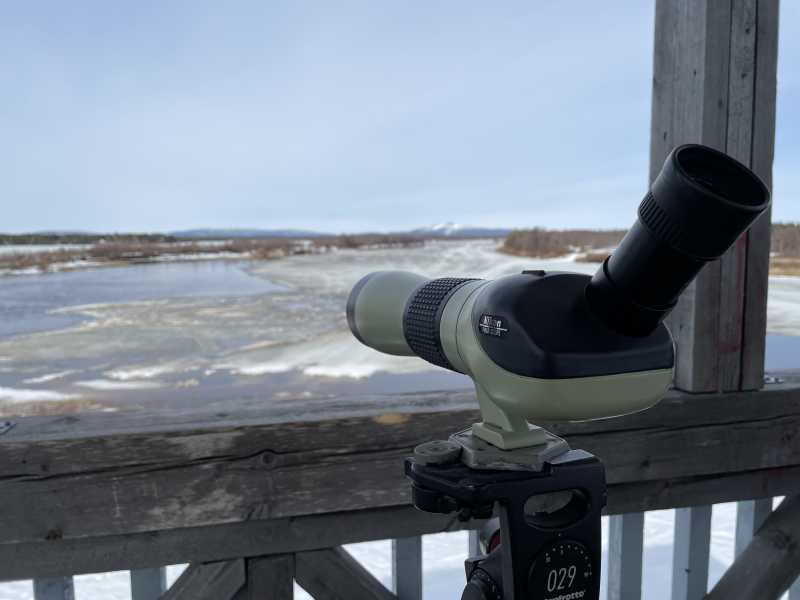 Telescope in the bird tower.  In the background Levitunturi and icy Ounasjoki.