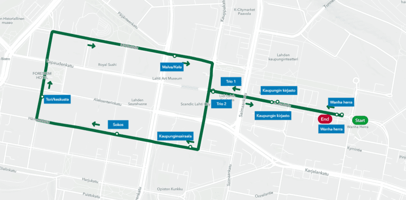 A map on which a straight line and then a square route are marked with a green line.  Place names such as Wanha herra, city hospital, Sokos and Trio are marked along the route in blue.
