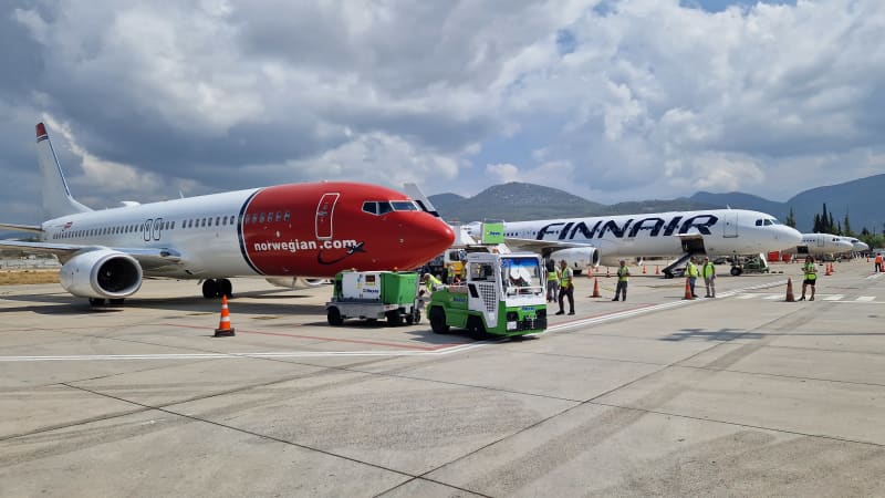 Norwegian and Finnair passenger planes Passengers at Alanya Gazipasa Airport