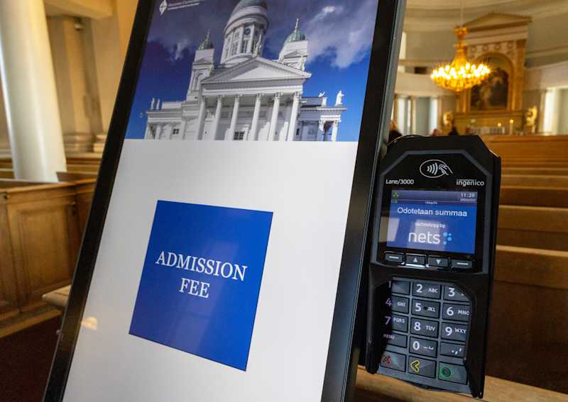 Large, vertical display and next to it.  The screen shows: Admission Fee.