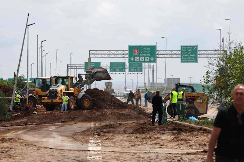 Israeli Rescue Services is cleaning the road outside the Israeli Ben Gurion Airport.