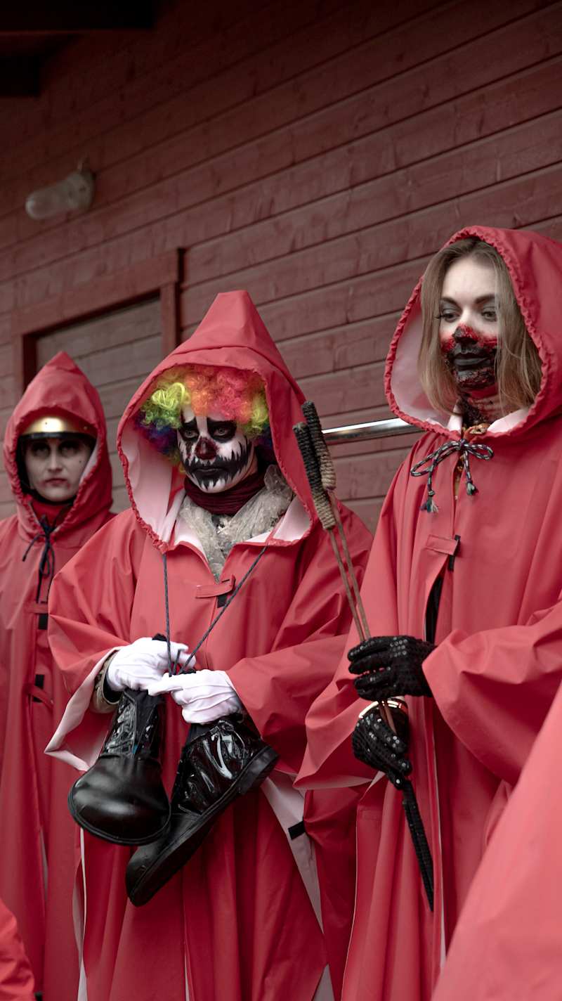 Jessica Koskiranta and other performers in red.