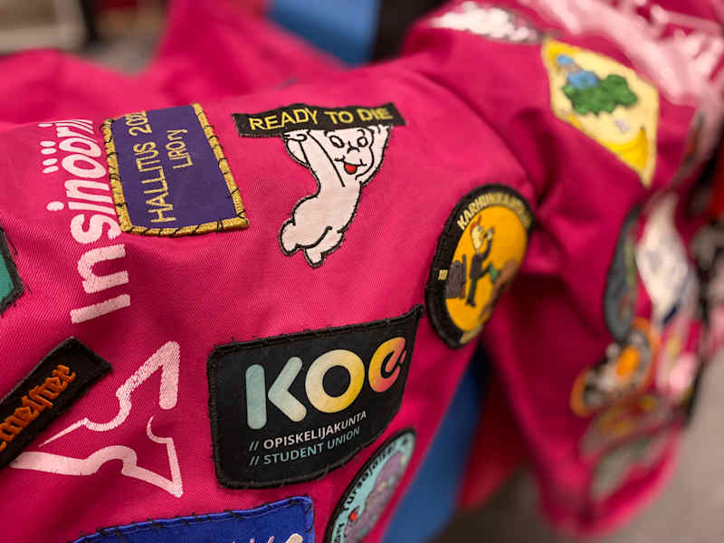 University of Applied Sciences students' coverall badges.